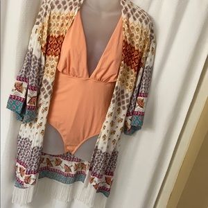 One piece peach bathing suit swim suit